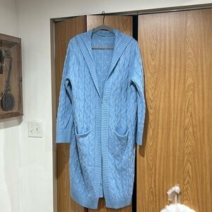 No name brand, ordered through Amazon, size XL. Light blue cardigan